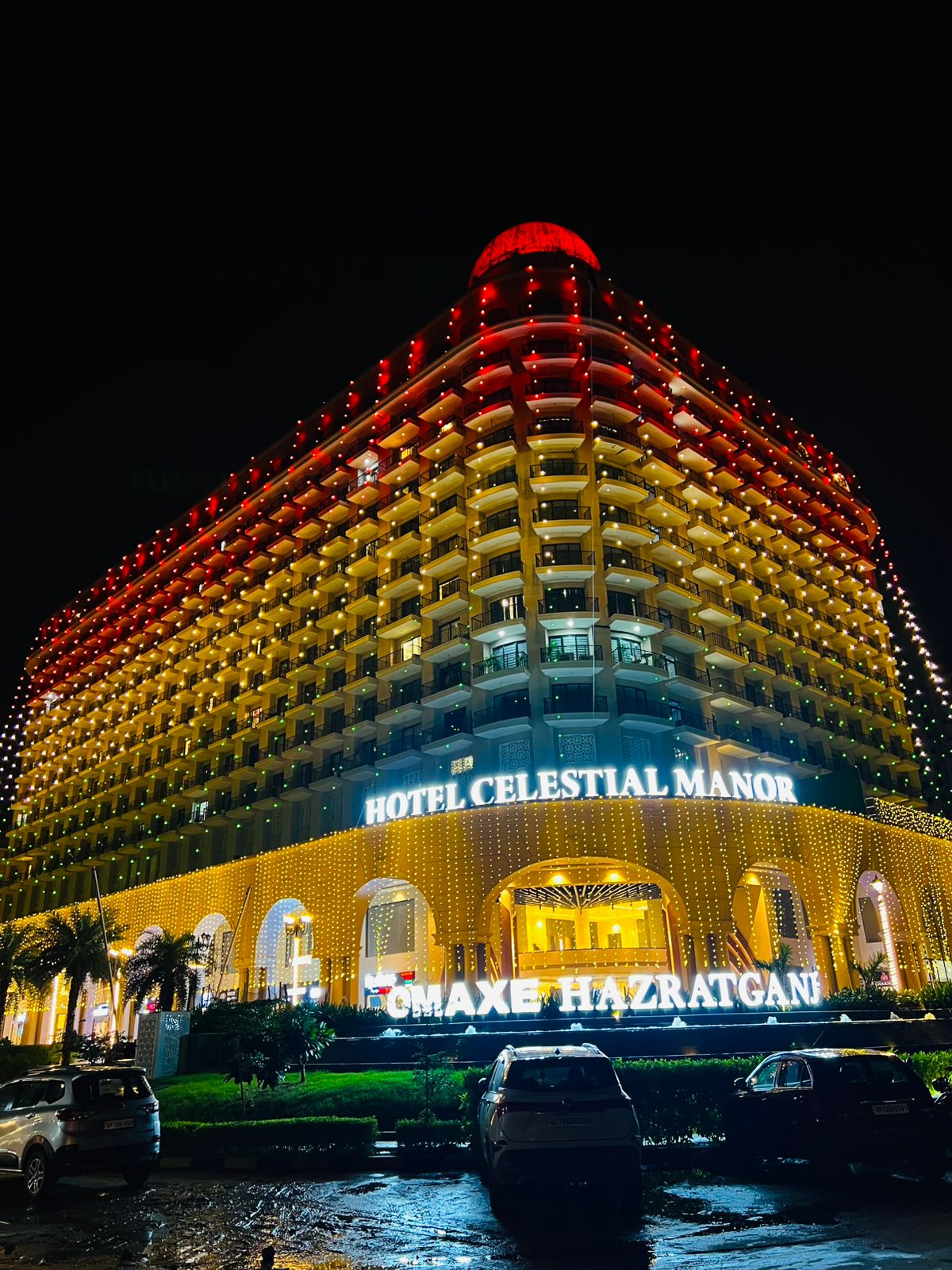 OMAXE Hazratganj building at night