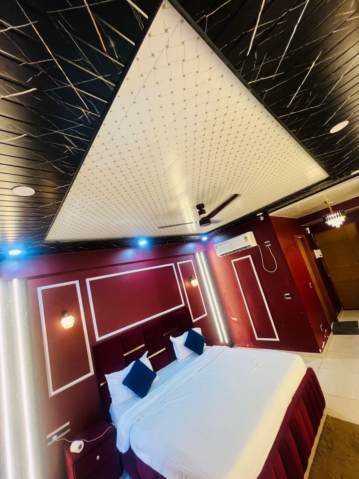 LED wall and king bed